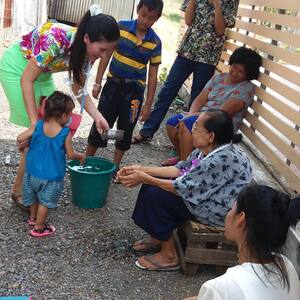 Pouring water to honor elders, Prabaht Church