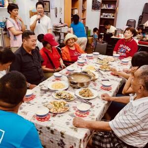 Elderly enjoying the youth camp prepared meal