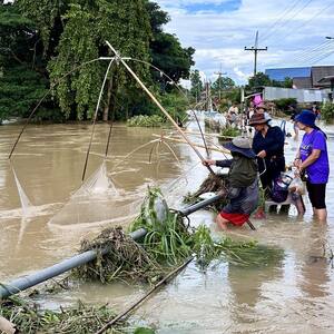 people fishing off the streets