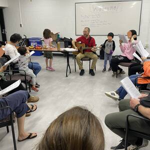 Singing praise songs before Bible discussion